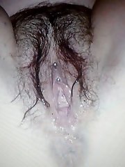 A seasoned elderly woman removes her provocative undergarments